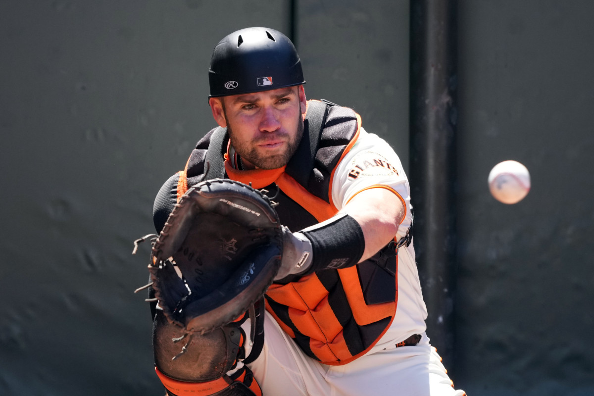 Austin Wynns catches and waits for another NL West opportunity. (2023)